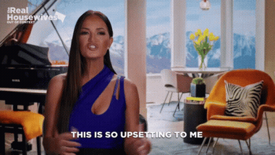 A Woman In A Blue Top Says This Is So Upsetting To Me GIF