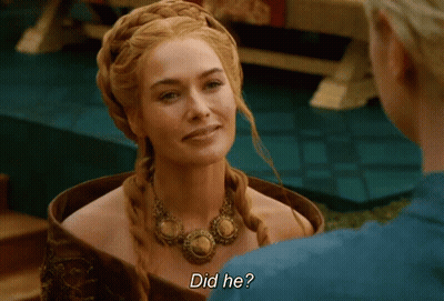 A Woman In A Braided Wig Talks To A Man And Says Did He GIF
