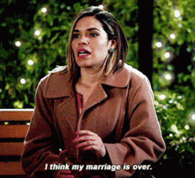 A Woman In A Brown Coat Is Sitting On A Bench And Saying I Think My Marriage Is Over GIF