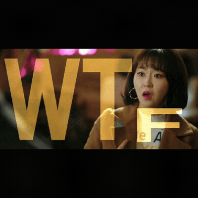 A Woman In A Brown Coat Is Standing In Front Of A Sign That Says Wtf . GIF