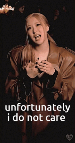 A Woman In A Brown Coat Says Unfortunately I Do Not Care GIF