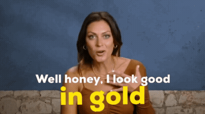 A Woman In A Brown Top Says Well Honey I Look Good In Gold GIF