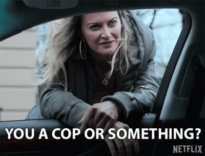 A Woman In A Car Asks If She Is A Cop Or Something On Netflix GIF