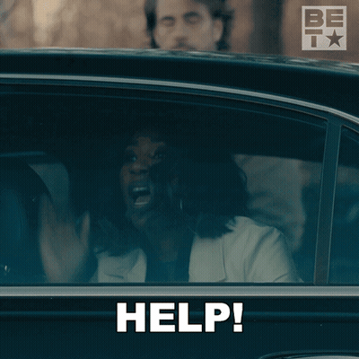 A Woman In A Car With Her Mouth Open And The Word Help Written On It GIF