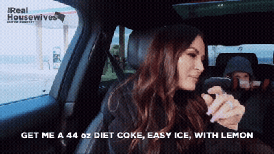 A Woman In A Car With The Words Get Me A 44 Oz Diet Coke Easy Ice With Lemon On The Bottom GIF