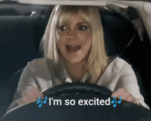 A Woman In A Car With The Words " I 'M So Excited " Above Her GIF