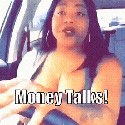 A Woman In A Car With The Words Money Talks Written On Her Chest GIF