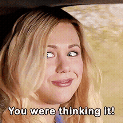 A Woman In A Car With The Words " You Were Thinking It " Below Her GIF