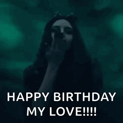 A Woman In A Cat Costume Is Blowing A Kiss And Saying Happy Birthday My Love . GIF