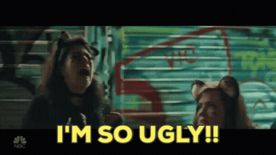 A Woman In A Cat Costume Says " I 'M So Ugly !! " GIF