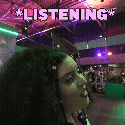 A Woman In A Club With The Word Listening Above Her Head GIF