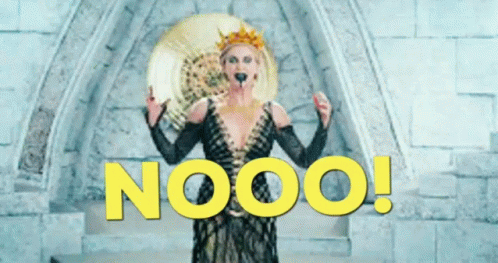 A Woman In A Costume With The Word Nooo Written In Yellow GIF