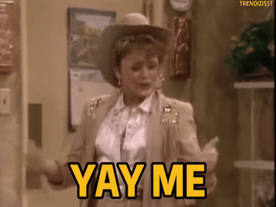 A Woman In A Cowboy Hat Is Dancing And Saying Yay Me GIF