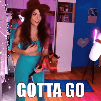 A Woman In A Cowboy Hat Is Holding A Toy Horse With The Words Gotta Go Written On The Bottom GIF