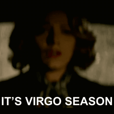 A Woman In A Dark Room With The Words It 'S Virgo Season Written Below Her GIF