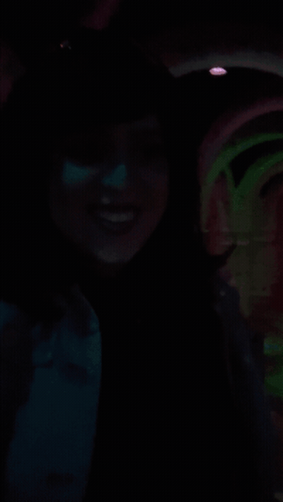 A Woman In A Dark Room With The Words No Shagrita On The Bottom Right GIF