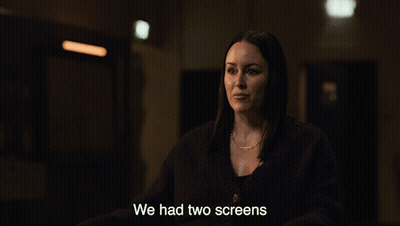 A Woman In A Dark Room With The Words We Had Two Screens Above Her GIF
