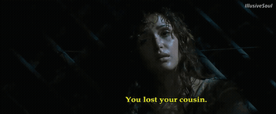 A Woman In A Dark Room With The Words You Lost Your Cousin Below Her GIF