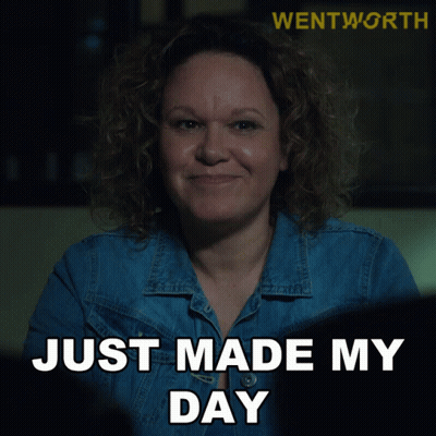 A Woman In A Denim Jacket Is Making A Face And Says Just Made My Day GIF