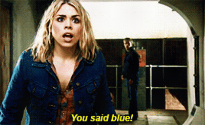 A Woman In A Denim Jacket Says " You Said Blue " In Front Of A Man GIF