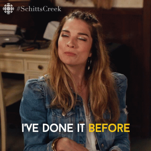 A Woman In A Denim Jacket With The Words I 'Ve Done It Before Below Her GIF