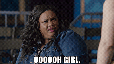 A Woman In A Denim Jacket With The Words Ooooh Girl On Her Face GIF