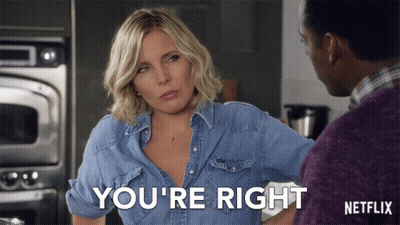 A Woman In A Denim Shirt Says " You 'Re Right " To A Man GIF