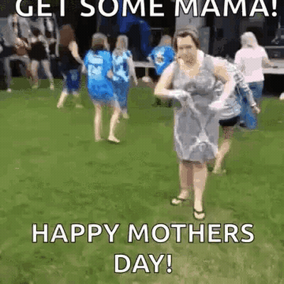 A Woman In A Dress Is Dancing In The Grass With A Group Of Women . GIF