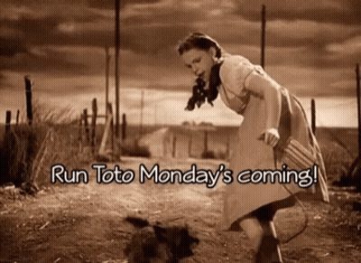 A Woman In A Dress Is Running Down A Dirt Road . GIF