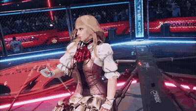 A Woman In A Dress Is Standing In A Boxing Ring With A Sign That Says Dominion GIF
