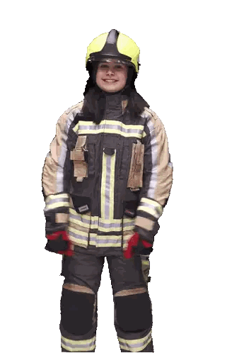 A Woman In A Fireman 'S Uniform With A Yellow Helmet Sticker