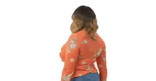 A Woman In A Floral Top And Blue Jeans Is Standing In Front Of A White Background . Sticker