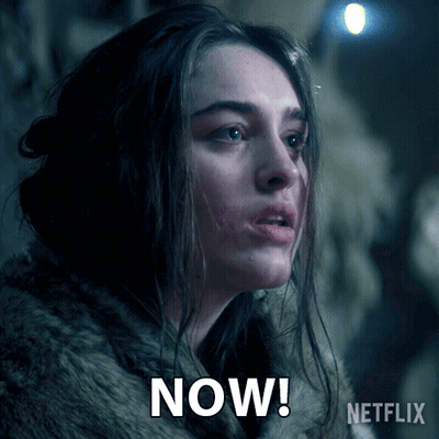 A Woman In A Fur Coat Says " Now " In A Netflix Ad GIF