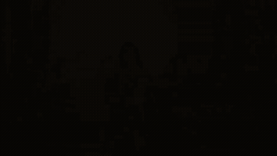 A Woman In A Gold Dress Is Surrounded By A Group Of Women GIF