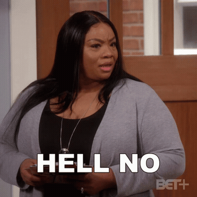 A Woman In A Gray Cardigan Says Hell No GIF