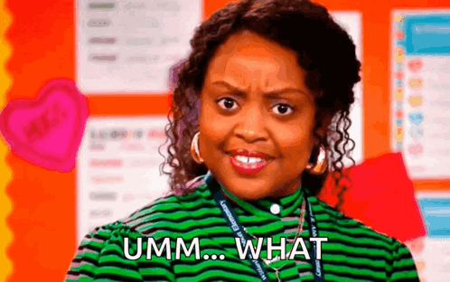 A Woman In A Green And Black Striped Shirt Is Making A Funny Face And Saying `` Umm ... What '' . GIF