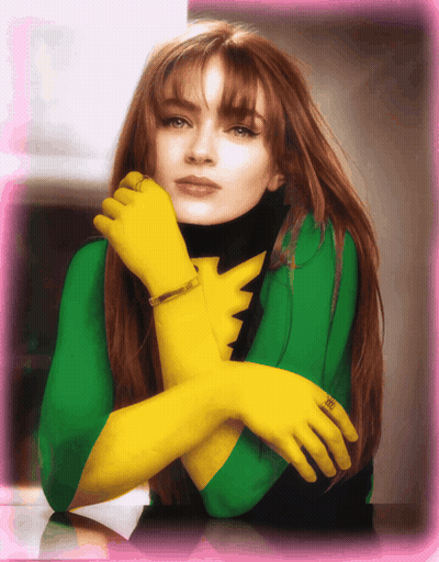 A Woman In A Green And Yellow Superhero Costume Has A Ring On Her Finger GIF