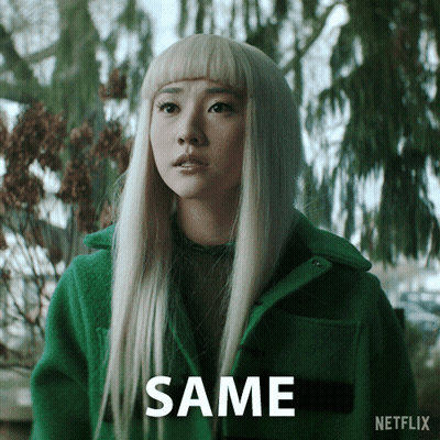 A Woman In A Green Coat Says Same GIF