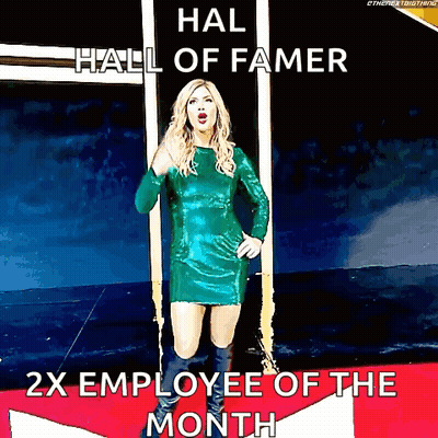 A Woman In A Green Dress Is Standing On A Red Carpet With The Words Hall Of Famer 2X Employee Of The Month GIF