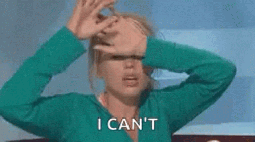 A Woman In A Green Shirt Is Covering Her Face With Her Hands And Says `` I Can 'T '' . GIF