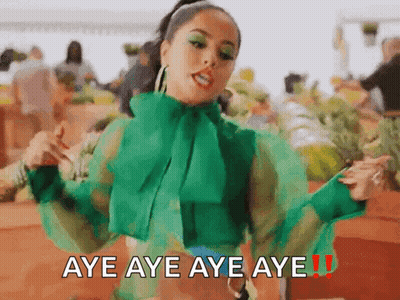 A Woman In A Green Shirt Is Dancing With The Words Aye Aye Aye Aye Written Below Her GIF