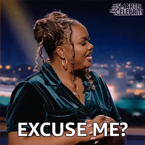 A Woman In A Green Shirt Says Excuse Me On A Screen GIF