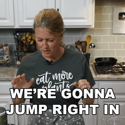 A Woman In A Green Shirt That Says " Eat More Plants " Says We 'Re Gonna Jump Right In GIF