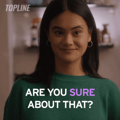 A Woman In A Green Sweater Is Asking If She Is Sure About Something GIF