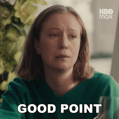A Woman In A Green Sweater Says Good Point In White Letters GIF