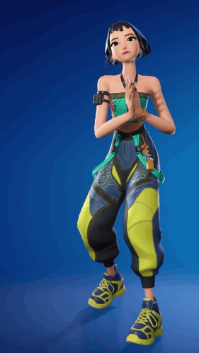 A Woman In A Green Top And Yellow Pants Is Standing In Front Of A Blue Background GIF