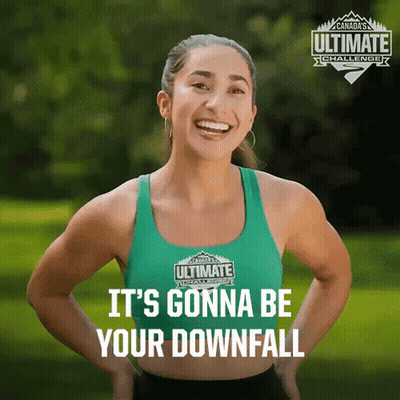 A Woman In A Green Ultimate Challenge Tank Top GIF