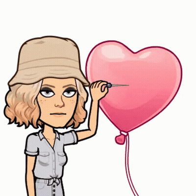 A Woman In A Hat Is Holding A Heart Shaped Balloon GIF