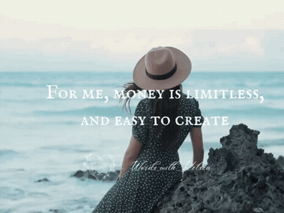 A Woman In A Hat Sits On A Rock Near The Ocean With The Words " For Me Money Is Limitless And Easy To Create " GIF