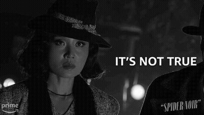 A Woman In A Hat Stands Next To A Man With The Words " It 'S Not True " Above Her GIF